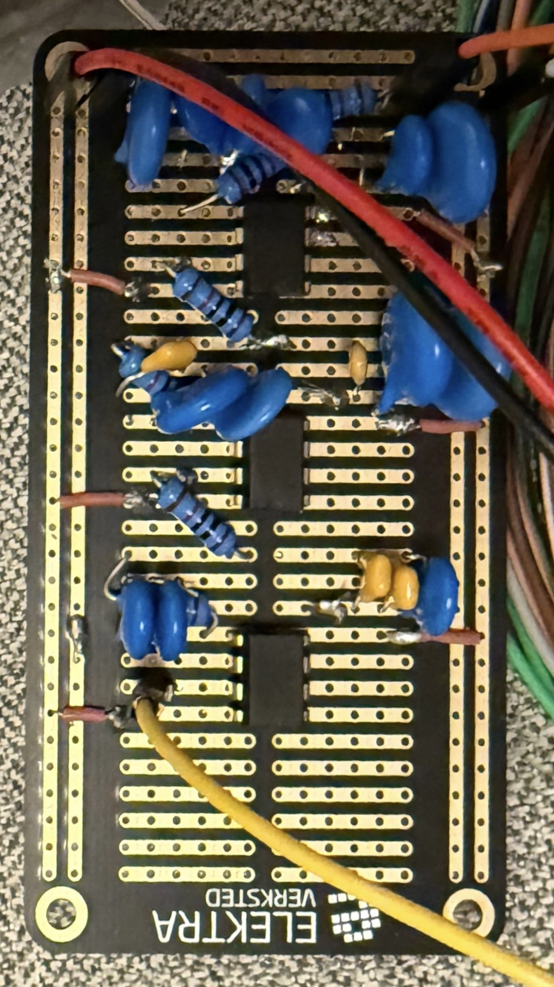 The same circuit transferred to an Elektra-branded stripboard, soldered.