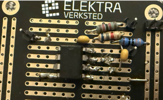 Wider view of the same Elektra Verksted veroboard with the full filter populated: series resistor pairs, capacitors, and the op-amp soldered in.